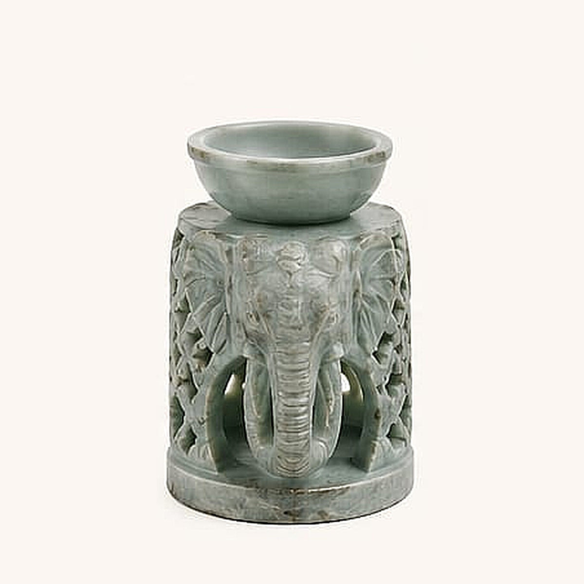 Hand-carved marble elephant oil burner, front view